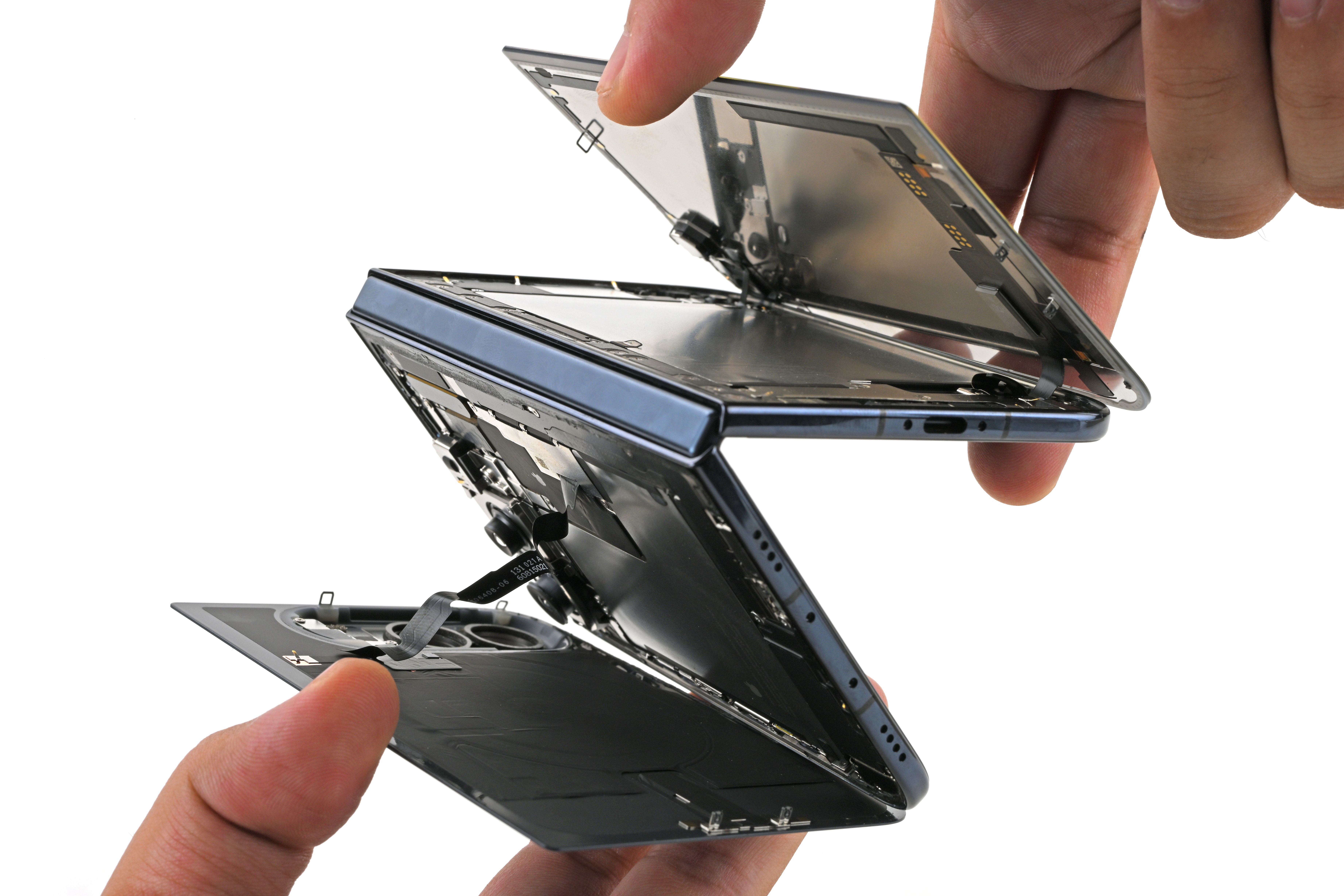 Some iPhone Duo Models Are Breaking. iFixit’s Teardown Might Explain Why — Wired