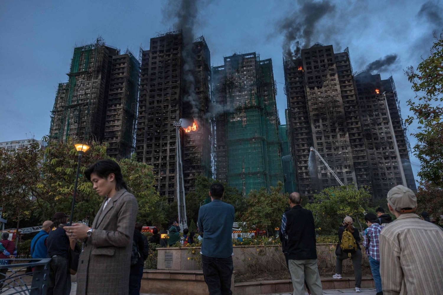 Hong Kong leader apologizes for deadly Tai Po fire, pledges reform — Japan Times